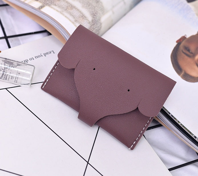 New tri-fold PU ladies wallet simple solid color short elephant nose Korean version of the coin purse