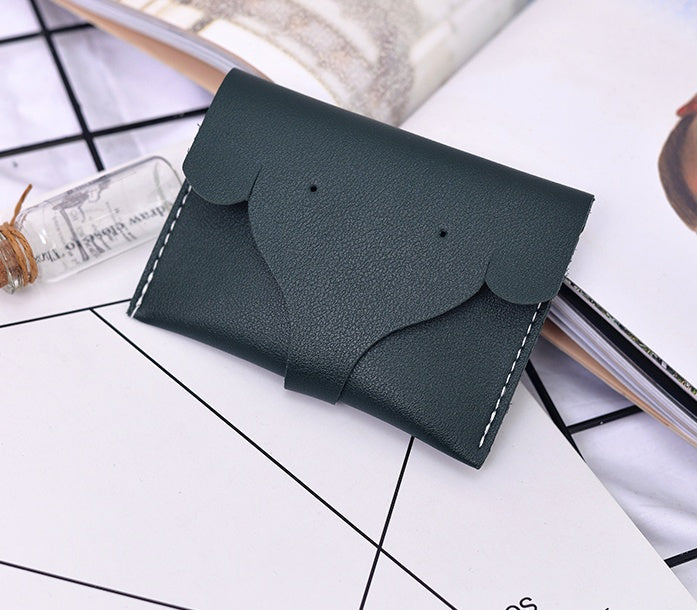 New tri-fold PU ladies wallet simple solid color short elephant nose Korean version of the coin purse