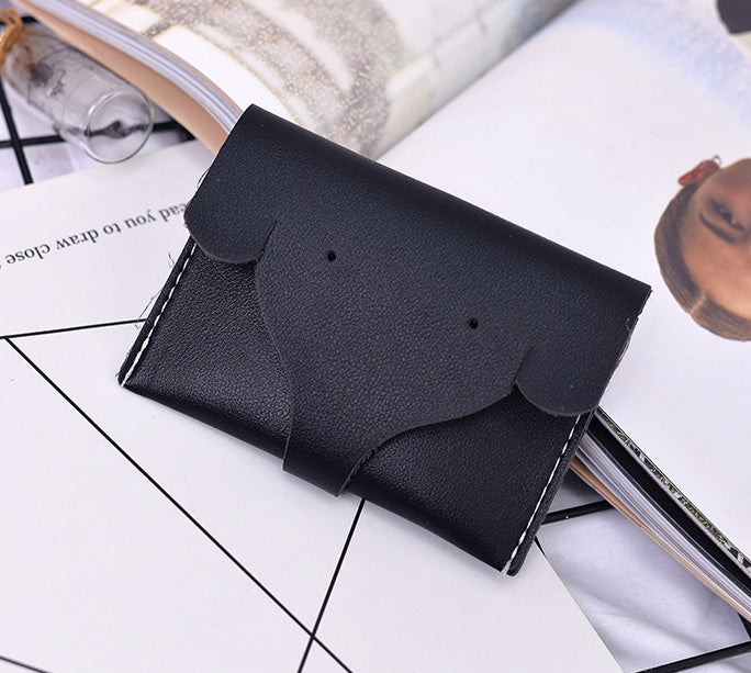 New tri-fold PU ladies wallet simple solid color short elephant nose Korean version of the coin purse